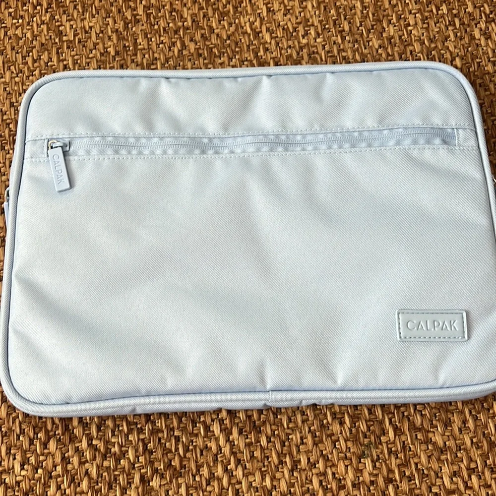 (2) brand new calpak laptop pouches